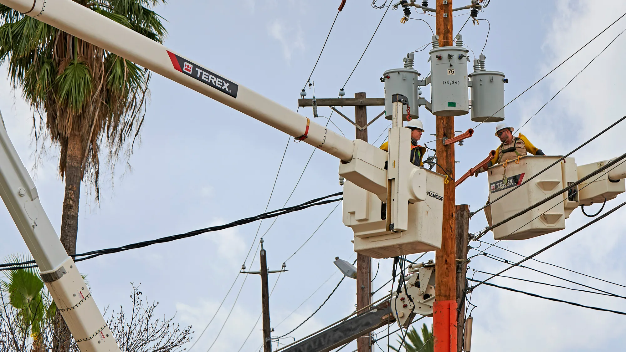 A Linetec Employee works on power lines in Laredo, Texas